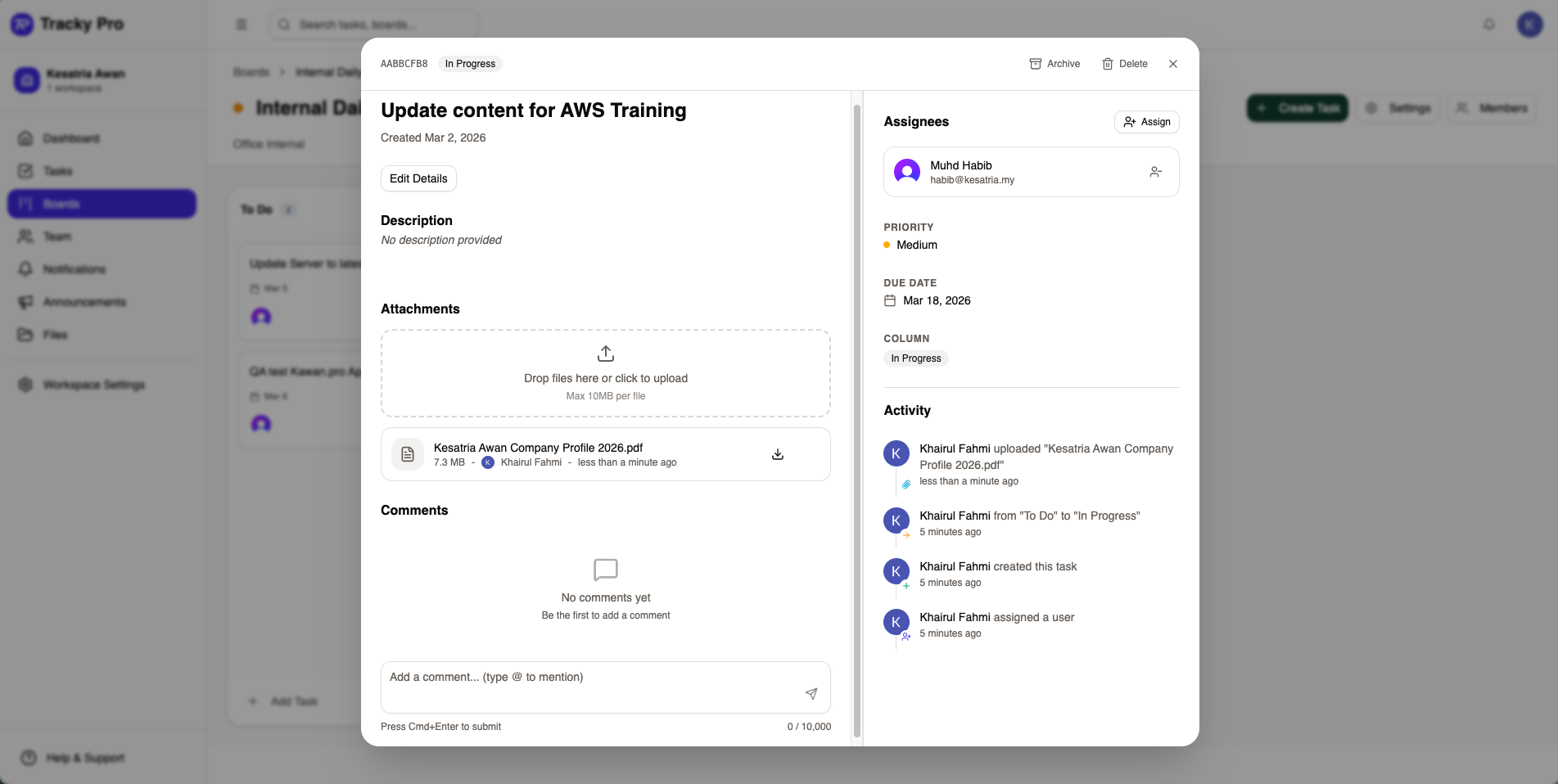 Tracky task detail view with assignees, priority, due date, attachments, and activity log